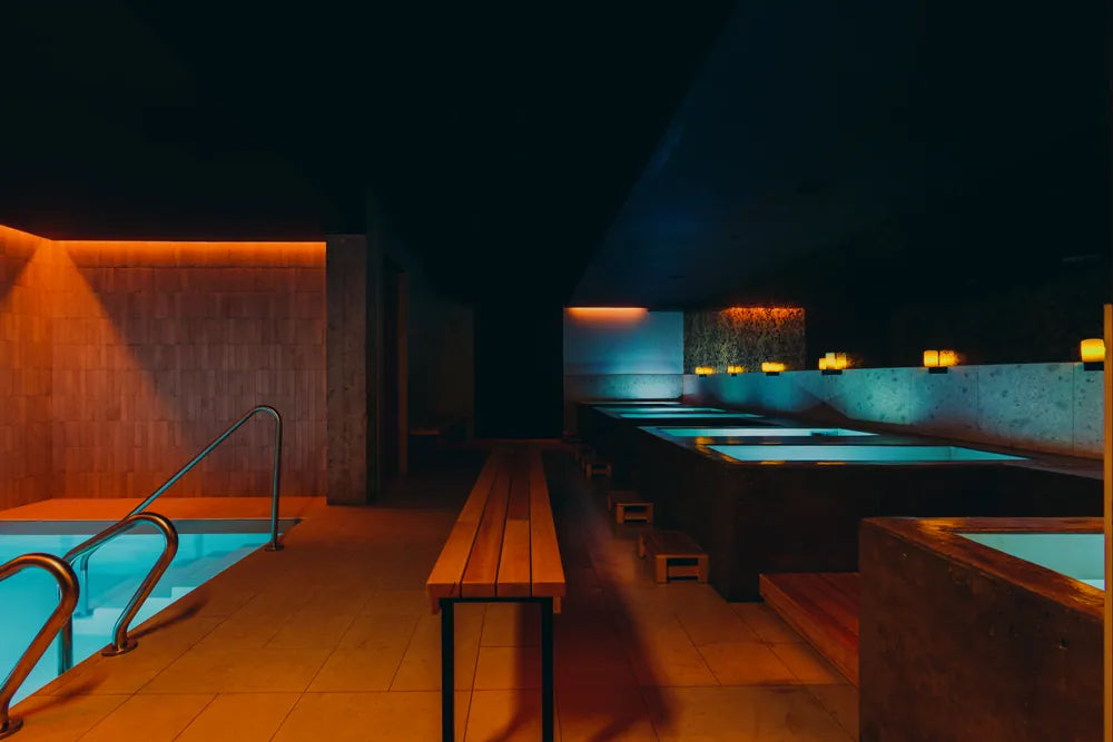 Cold plunge pools lit in blue
